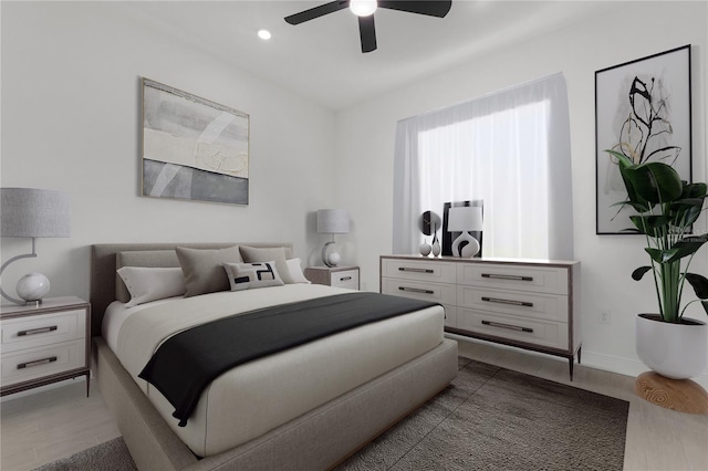 bedroom featuring ceiling fan and dark wood-type flooring