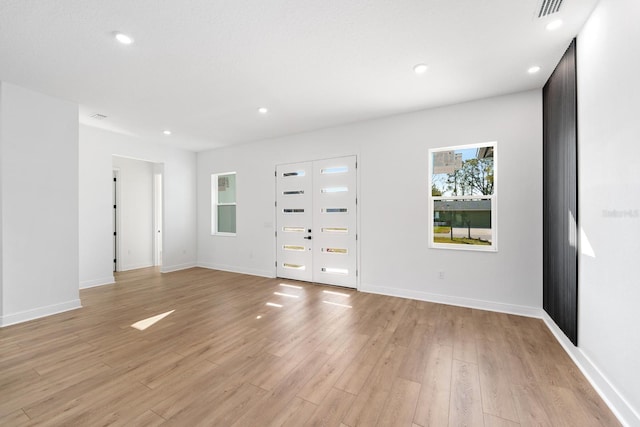 entrance foyer featuring light hardwood / wood-style flooring