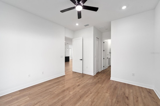 unfurnished bedroom featuring ceiling fan and light wood-type flooring