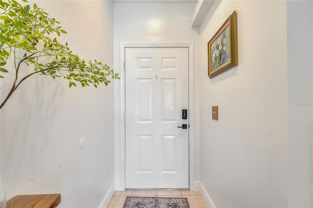 entryway featuring light tile patterned floors