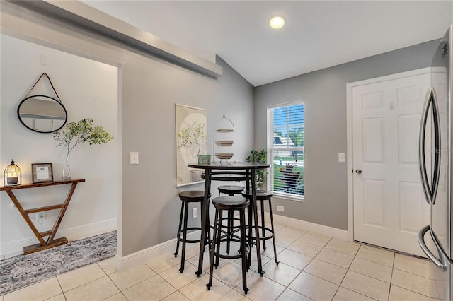 dining room with light tile patterned floors