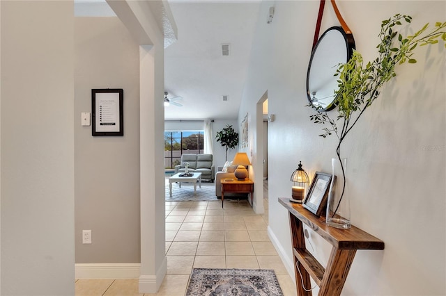 hallway featuring light tile patterned floors