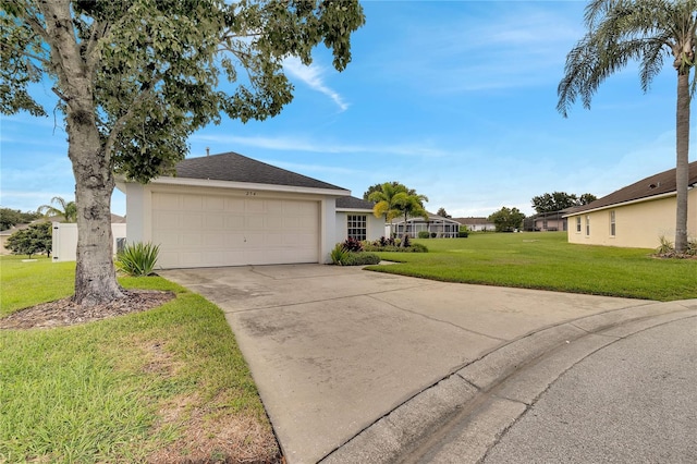 ranch-style home featuring a garage and a front yard