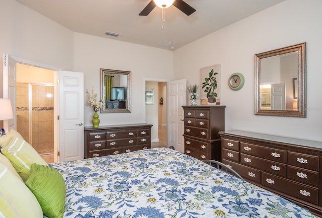 bedroom with ceiling fan and ensuite bath