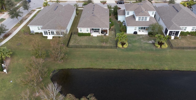 bird's eye view with a water view