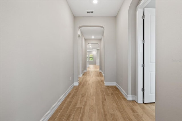 hall featuring light hardwood / wood-style floors