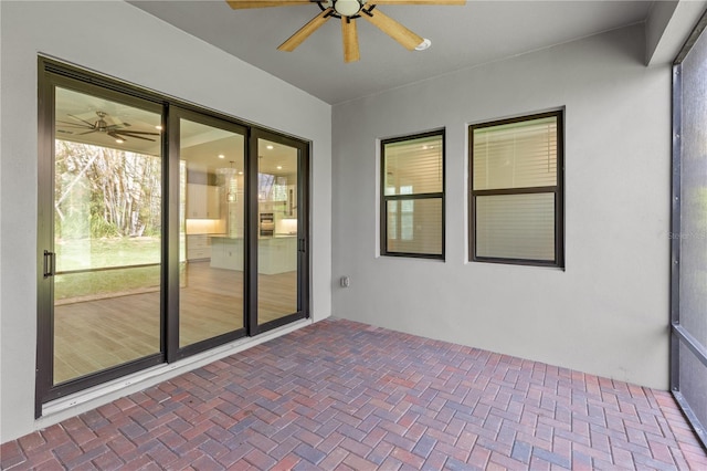 view of patio / terrace featuring ceiling fan