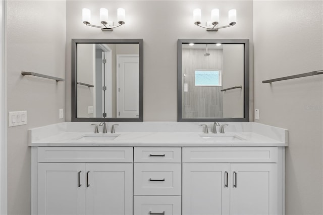 bathroom with a shower and vanity