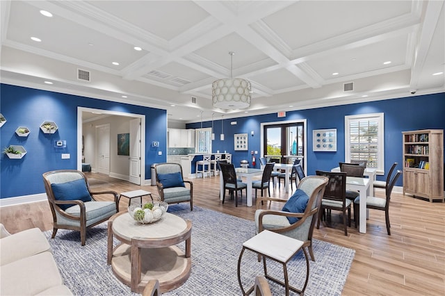 living room featuring light hardwood / wood-style floors, crown molding, beam ceiling, and coffered ceiling