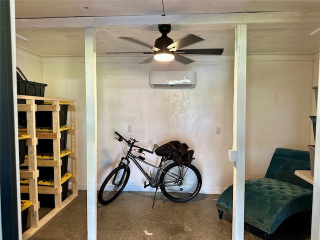 basement featuring ceiling fan and a wall mounted AC