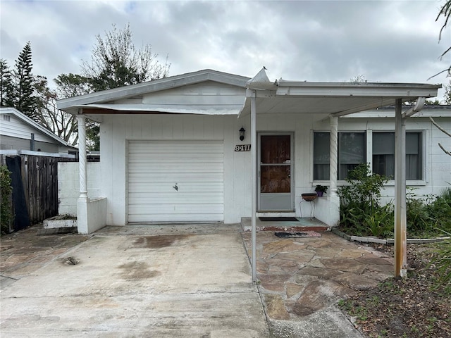 view of front of home with a garage