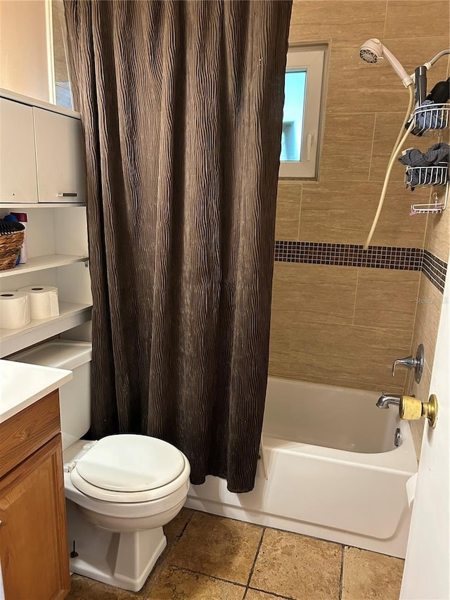 full bathroom with vanity, toilet, and shower / tub combo with curtain