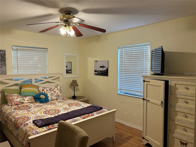 bedroom featuring ceiling fan and light wood-type flooring