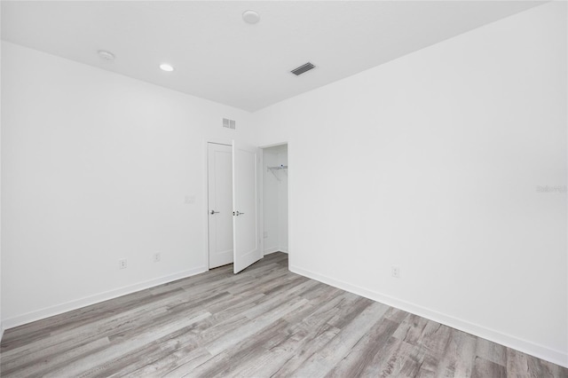 unfurnished bedroom featuring light hardwood / wood-style floors