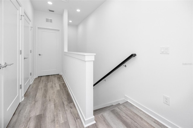 corridor featuring light wood-type flooring