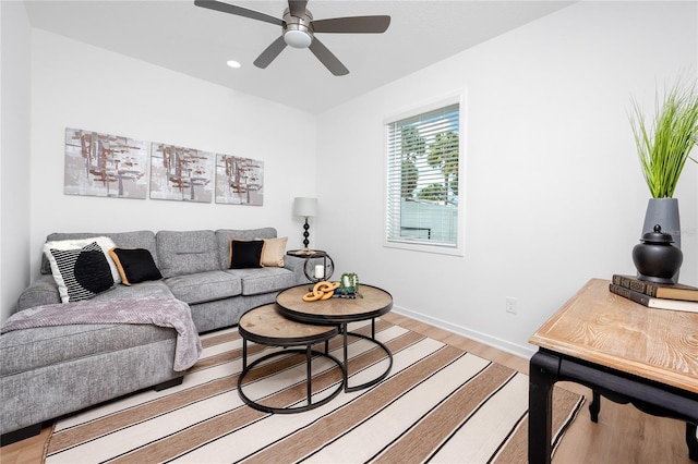 3402 E 28th Ave Unit 1, Tampa, FL 33605 - living area with light wood finished floors, ceiling fan, and recessed lighting