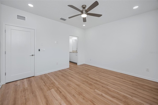 3402 E 28th Ave Unit 1, Tampa, FL 33605 - empty room featuring ceiling fan, light wood-type flooring, and recessed lighting