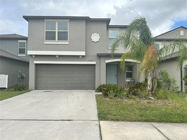 view of front of property with a garage