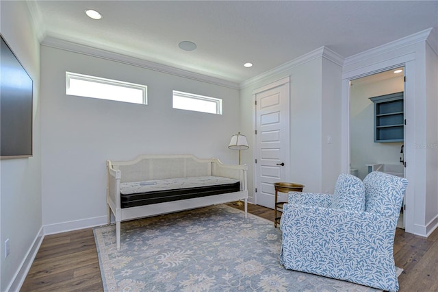 sitting room featuring crown molding and dark hardwood / wood-style floors