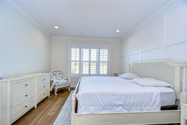 bedroom featuring dark hardwood / wood-style flooring and crown molding