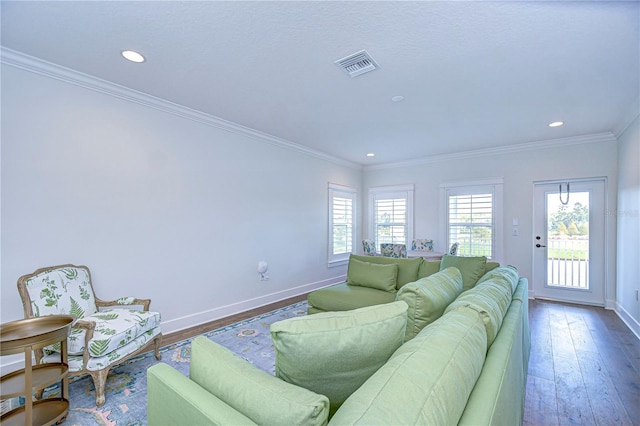 living room featuring hardwood / wood-style floors and ornamental molding