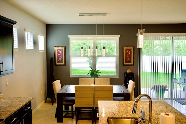 tiled dining area with sink