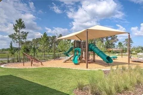 view of jungle gym with a yard