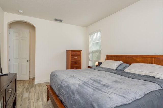 bedroom featuring light wood-type flooring