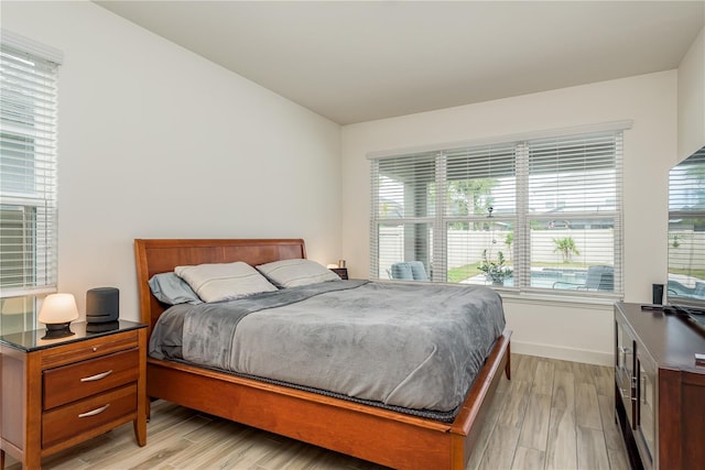 bedroom featuring light wood-type flooring