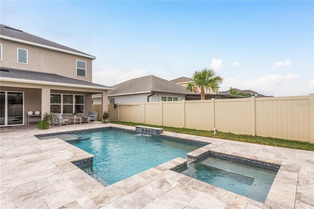 view of swimming pool featuring an in ground hot tub, an outdoor hangout area, and a patio