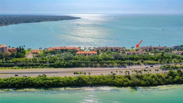 drone / aerial view featuring a water view