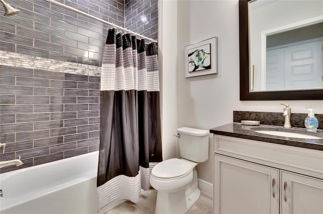 full bathroom with shower / tub combo with curtain, vanity, and toilet