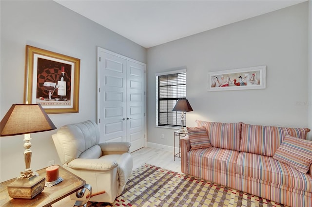 living room with light hardwood / wood-style floors