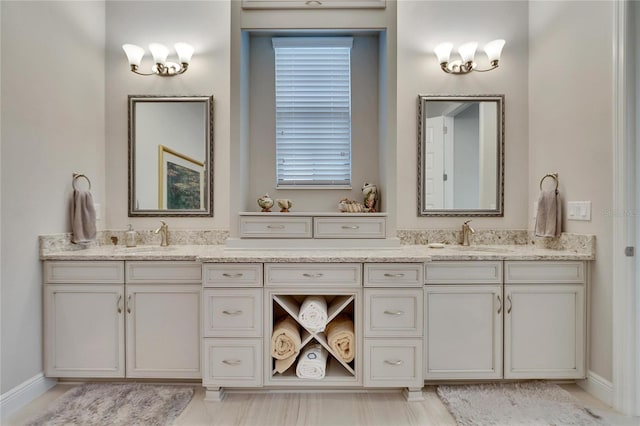 bathroom with vanity and a healthy amount of sunlight