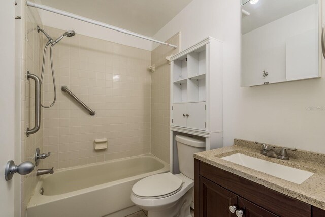 bathroom with toilet, shower / washtub combination, and vanity