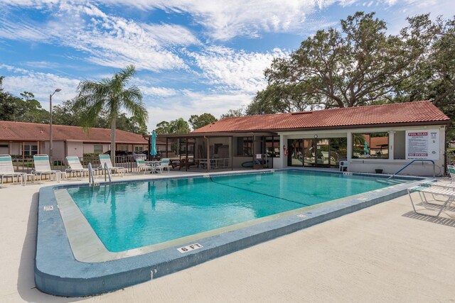 community pool featuring a patio