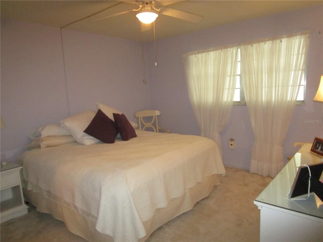 bedroom with carpet flooring and ceiling fan