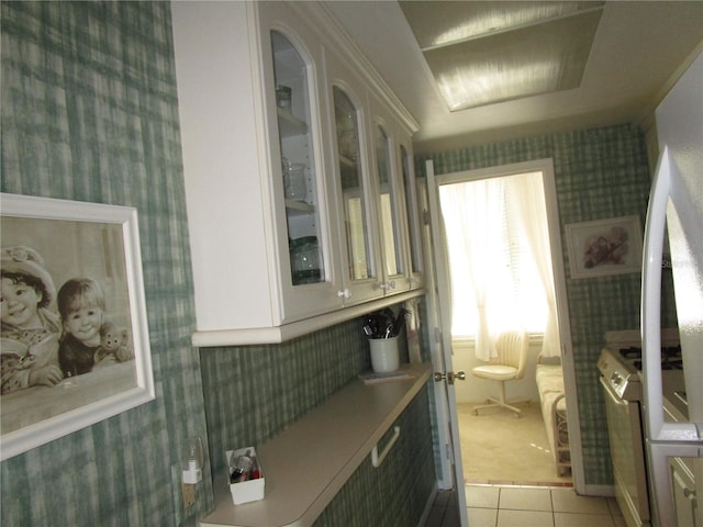 bathroom with tile patterned floors