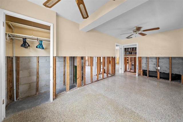 interior space featuring ceiling fan