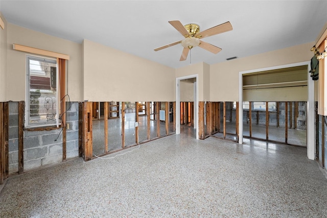 empty room featuring ceiling fan