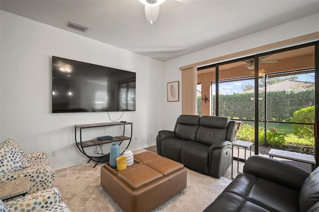 living room featuring ceiling fan