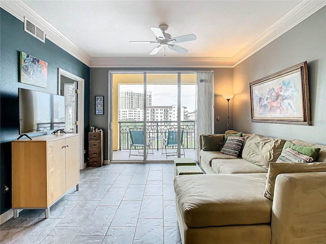 living room featuring ceiling fan and ornamental molding