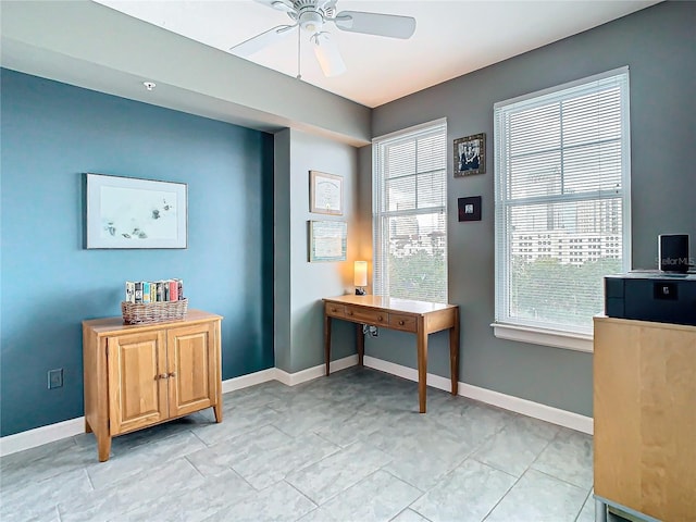 tiled office space with ceiling fan