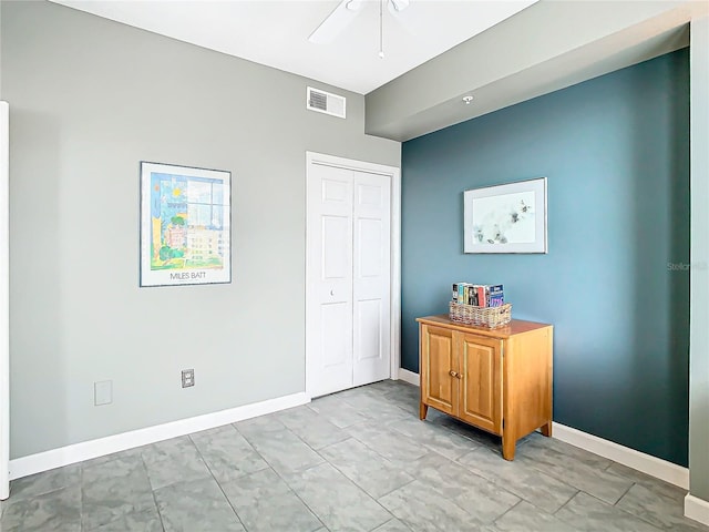 bedroom with a closet and ceiling fan