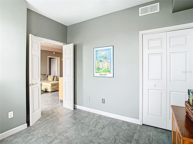 unfurnished bedroom featuring a closet