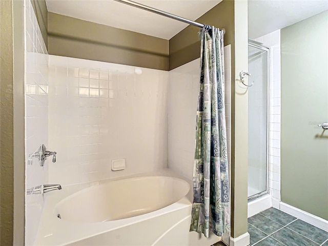 bathroom featuring tile patterned flooring and shower / bath combo with shower curtain