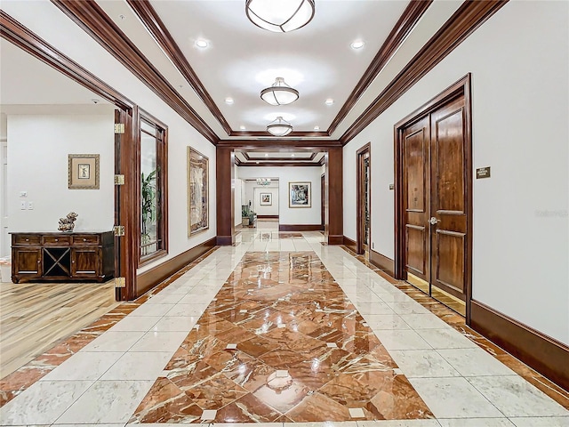 345 Bayshore Blvd Unit 610, Tampa, FL 33606 - corridor with inlaid floor details, a raised ceiling, crown molding, baseboards, and recessed lighting