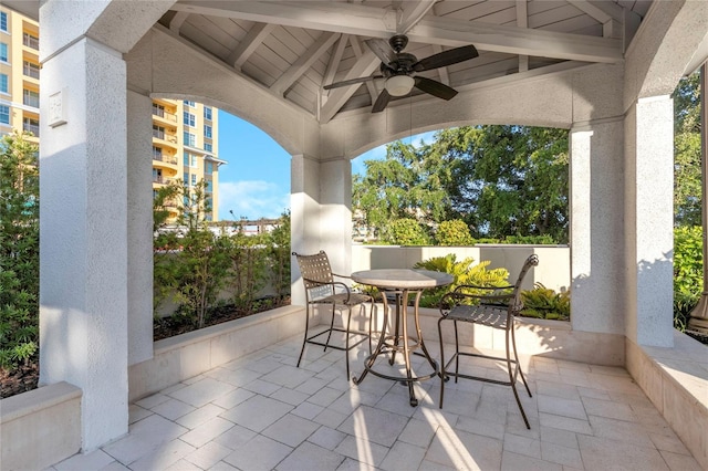 view of patio / terrace featuring ceiling fan