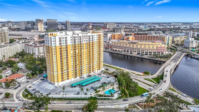 birds eye view of property with a water view