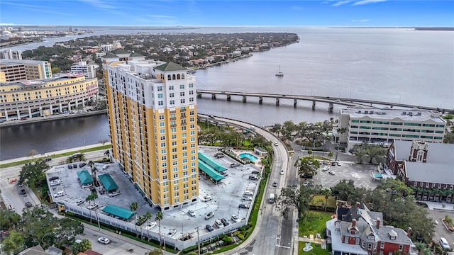 birds eye view of property with a water view